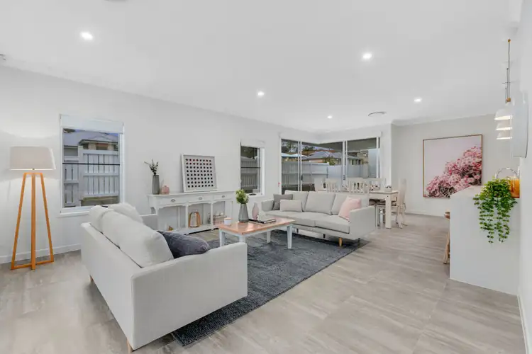 Main view of Homely semi-detached listing, 1/30 Kookaburra Circuit, Maudsland QLD 4210