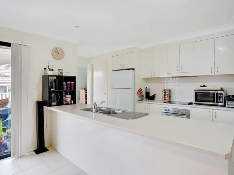 Sixth view of Homely house listing, 7 Arragan Court, Pacific Pines QLD 4211