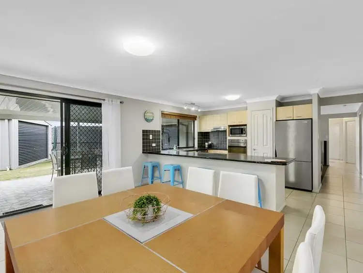 Sixth view of Homely house listing, 7 Peckham Court, Pacific Pines QLD 4211