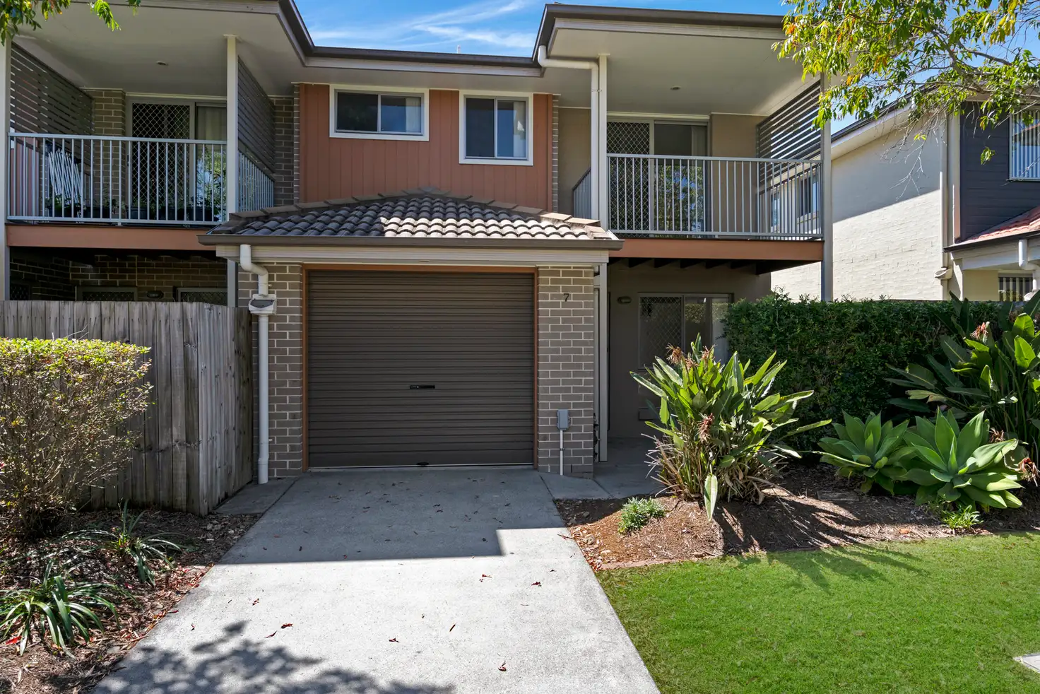 Main view of Homely townhouse listing, 7/131 McAuley Parade, Pacific Pines QLD 4211
