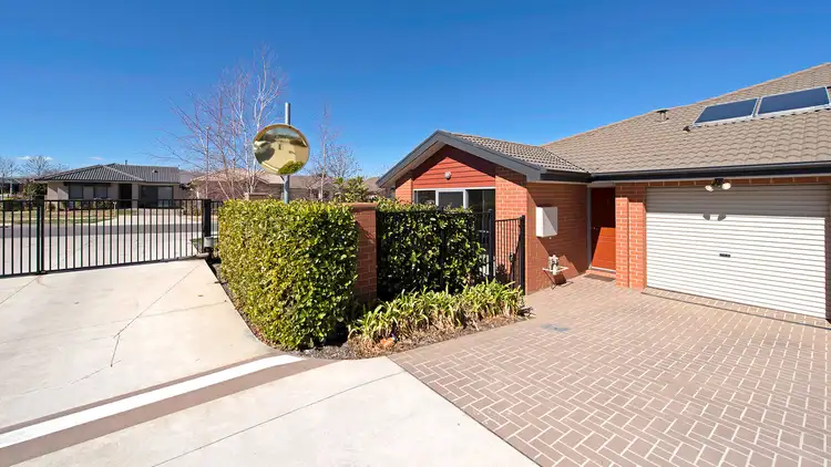 Main view of Homely townhouse listing, 1/10 Charles Perkins Circuit, Bonner ACT 2914