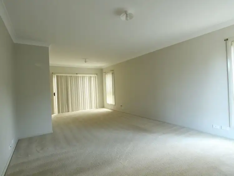Second view of Homely house listing, 1 Northampton Drive, Glenfield NSW 2167