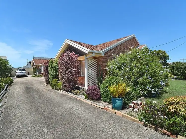 Main view of Homely villa listing, 1/19 Caves Beach Road, Caves Beach NSW 2281