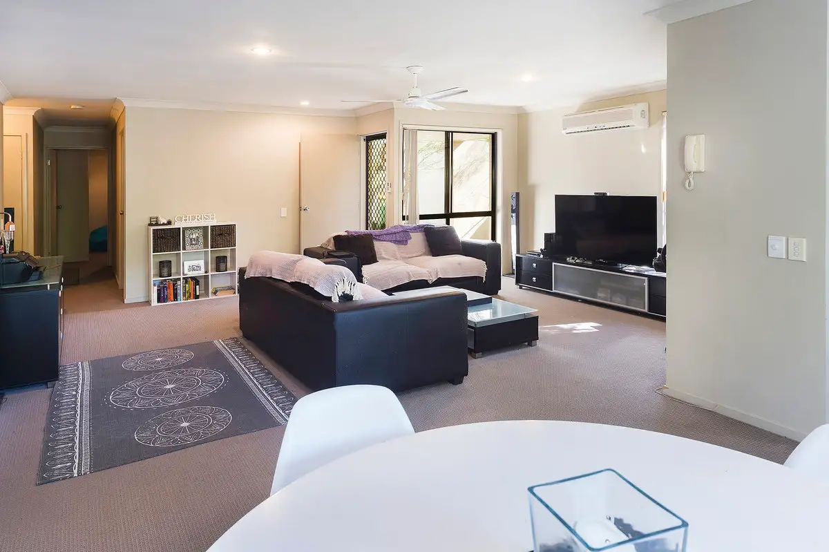 Main view of Homely townhouse listing, 100/590 Pine Ridge Road, Coombabah QLD 4216