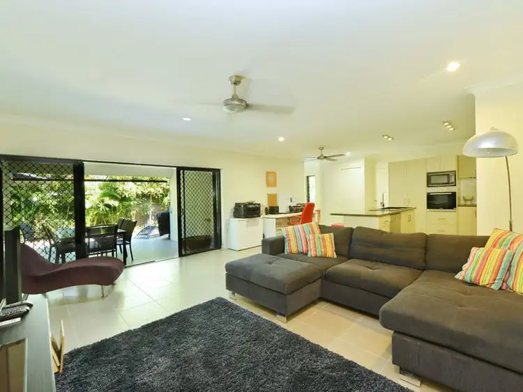 Main view of Homely semi-detached listing, 1/8 Michelia Street, Palm Cove QLD 4879