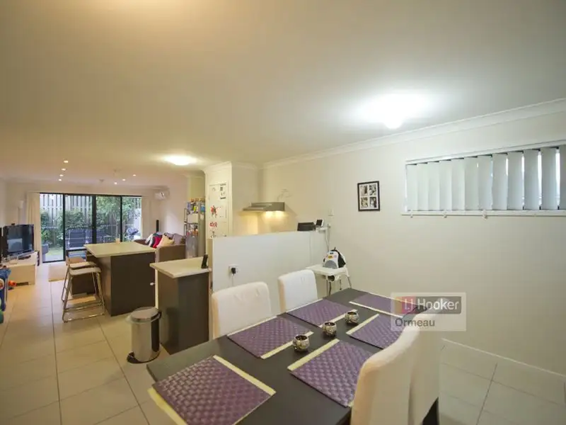 Main view of Homely semi-detached listing, 1/10 Achievement Drive, Ormeau QLD 4208