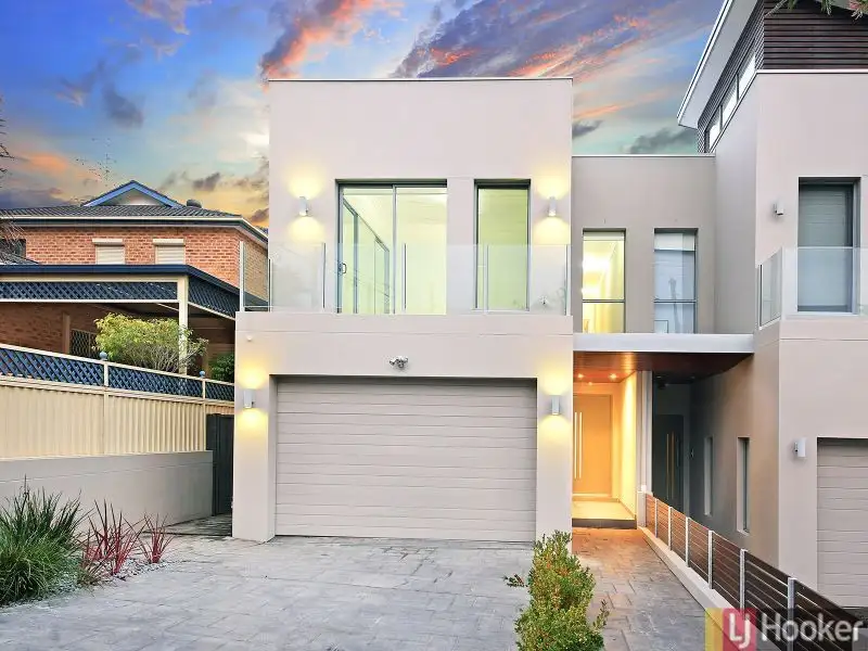 Main view of Homely semi-detached listing, 153 Hillcrest Ave, Greenacre NSW 2190