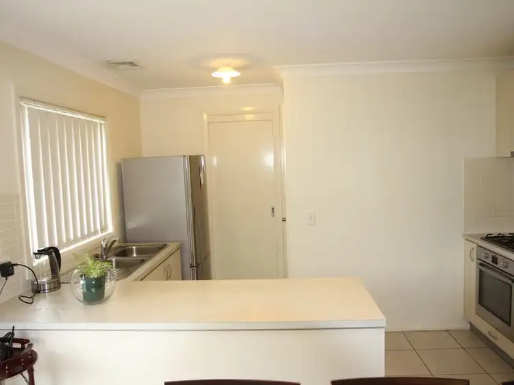 Third view of Homely semi-detached listing, 16 Northampton Drive, Glenfield NSW 2167