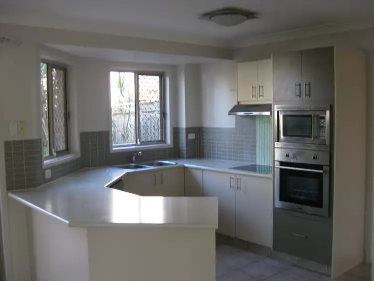 Third view of Homely townhouse listing, 1/12 Gordon Street, Labrador QLD 4215