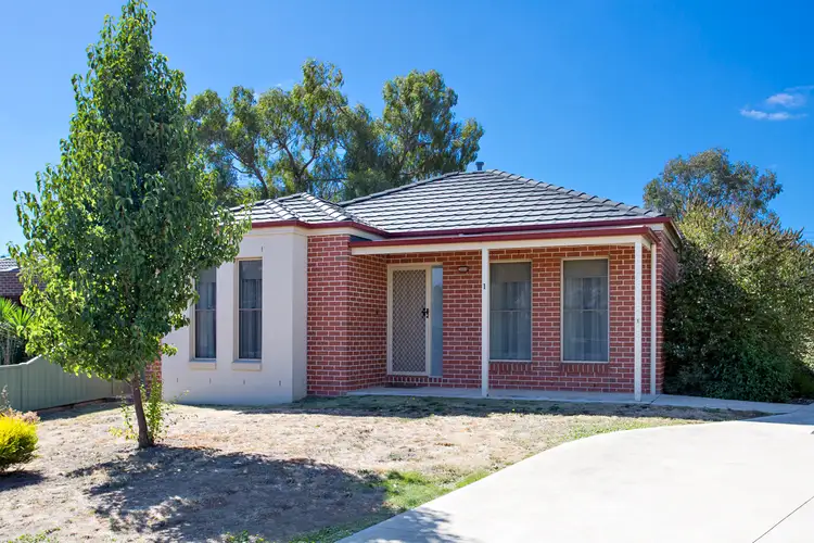Main view of Homely townhouse listing, 1/14 Rattray Court, Canadian VIC 3350