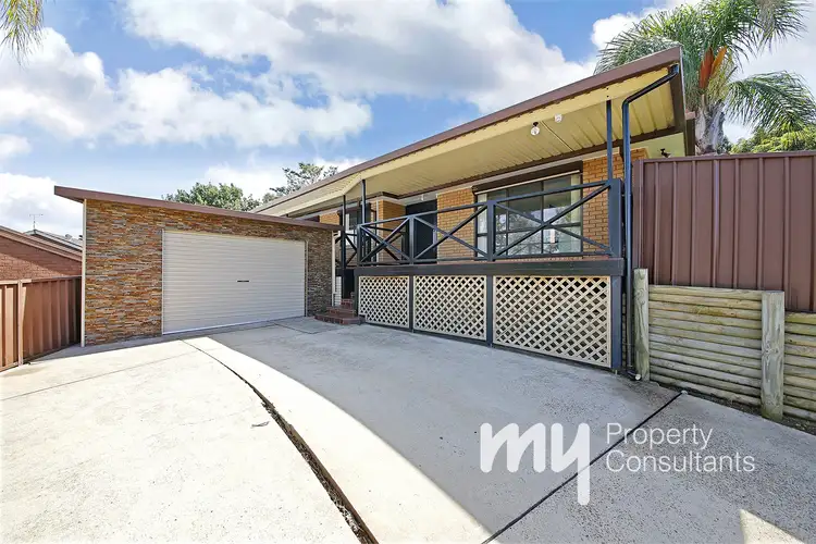 Main view of Homely house listing, 77 Crispsparkle Drive, Ambarvale NSW 2560