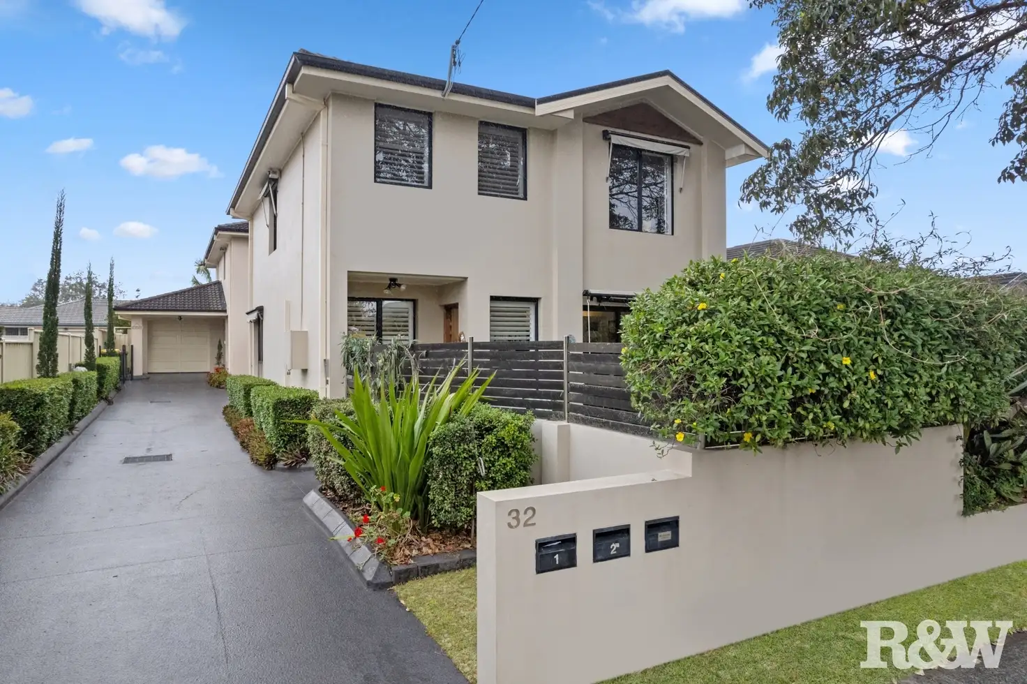 Main view of Homely townhouse listing, 1/32 Beach Street, Ettalong Beach NSW 2257