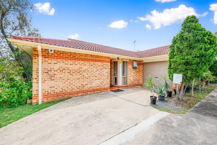 Main view of Homely villa listing, 1/48 Minto Road, Minto NSW 2566
