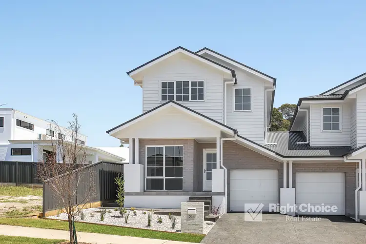 Main view of Homely semi-detached listing, 3 Wirraway Boulevard, Badagarang NSW 2540