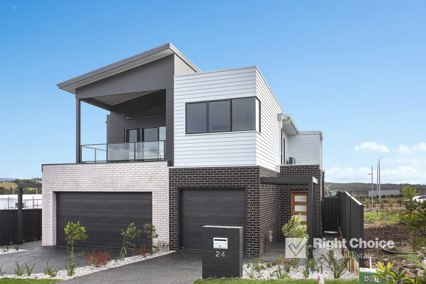 Main view of Homely semi-detached listing, 24 Galactic Drive, Dunmore NSW 2529