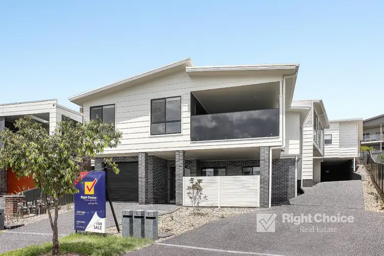 Main view of Homely townhouse listing, 1/7 Dillon Road, Flinders NSW 2529