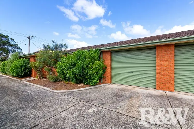 Main view of Homely villa listing, 1/9 Burrawang Street, Ettalong Beach NSW 2257