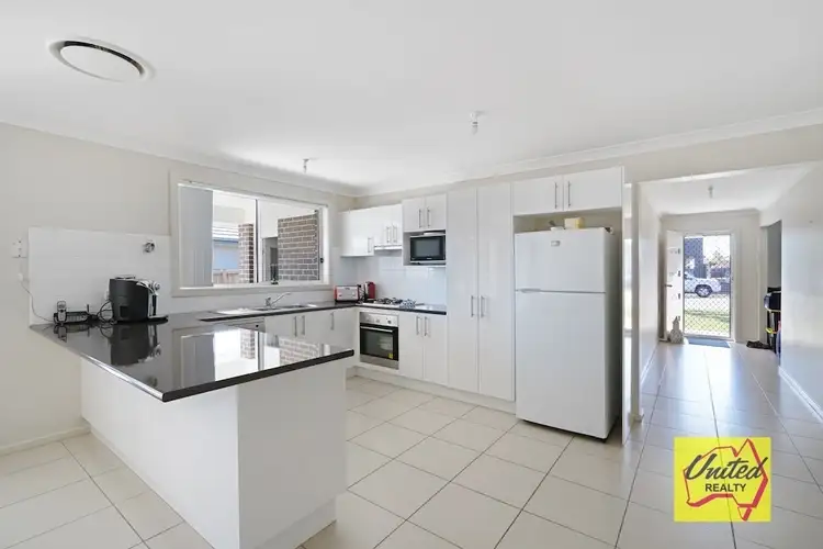 Second view of Homely house listing, 9 Higgins Avenue, Camden NSW 2570