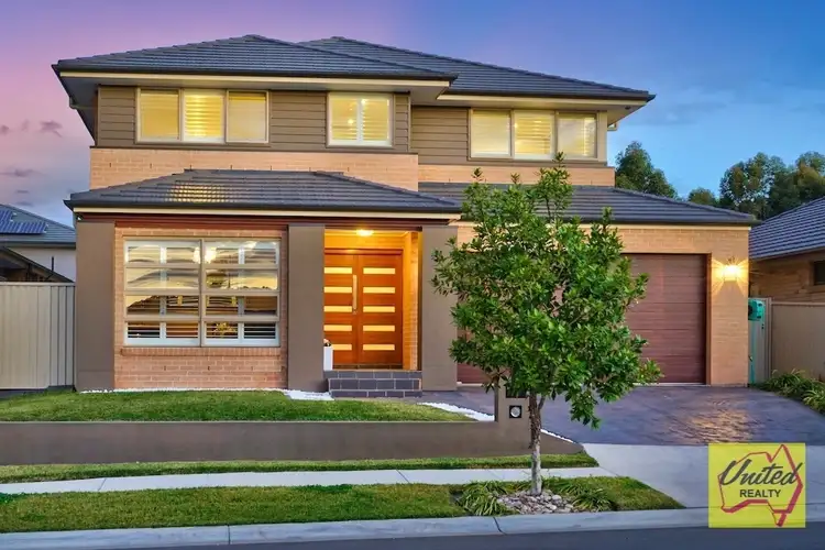 12 Caley Way, Mount Annan NSW 2567