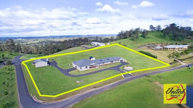 7 The Grand Circuit, Orangeville NSW 2570