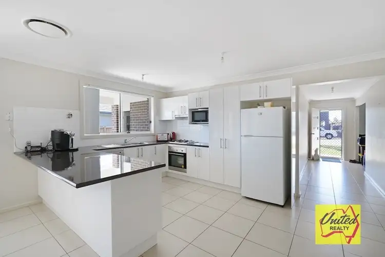 Second view of Homely house listing, 9 Higgins Avenue, Elderslie NSW 2570