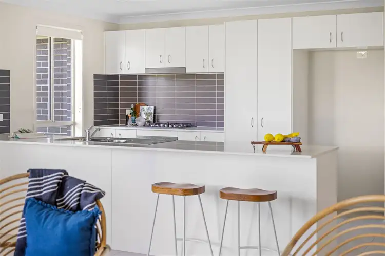 Main view of Homely townhouse listing, 2 Tourmaline Drive, Rutherford NSW 2320