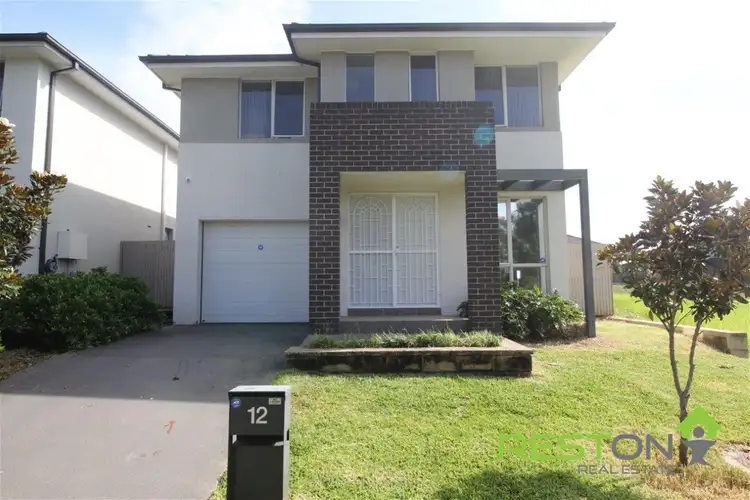 12 Regalia Crescent, Glenfield NSW 2167