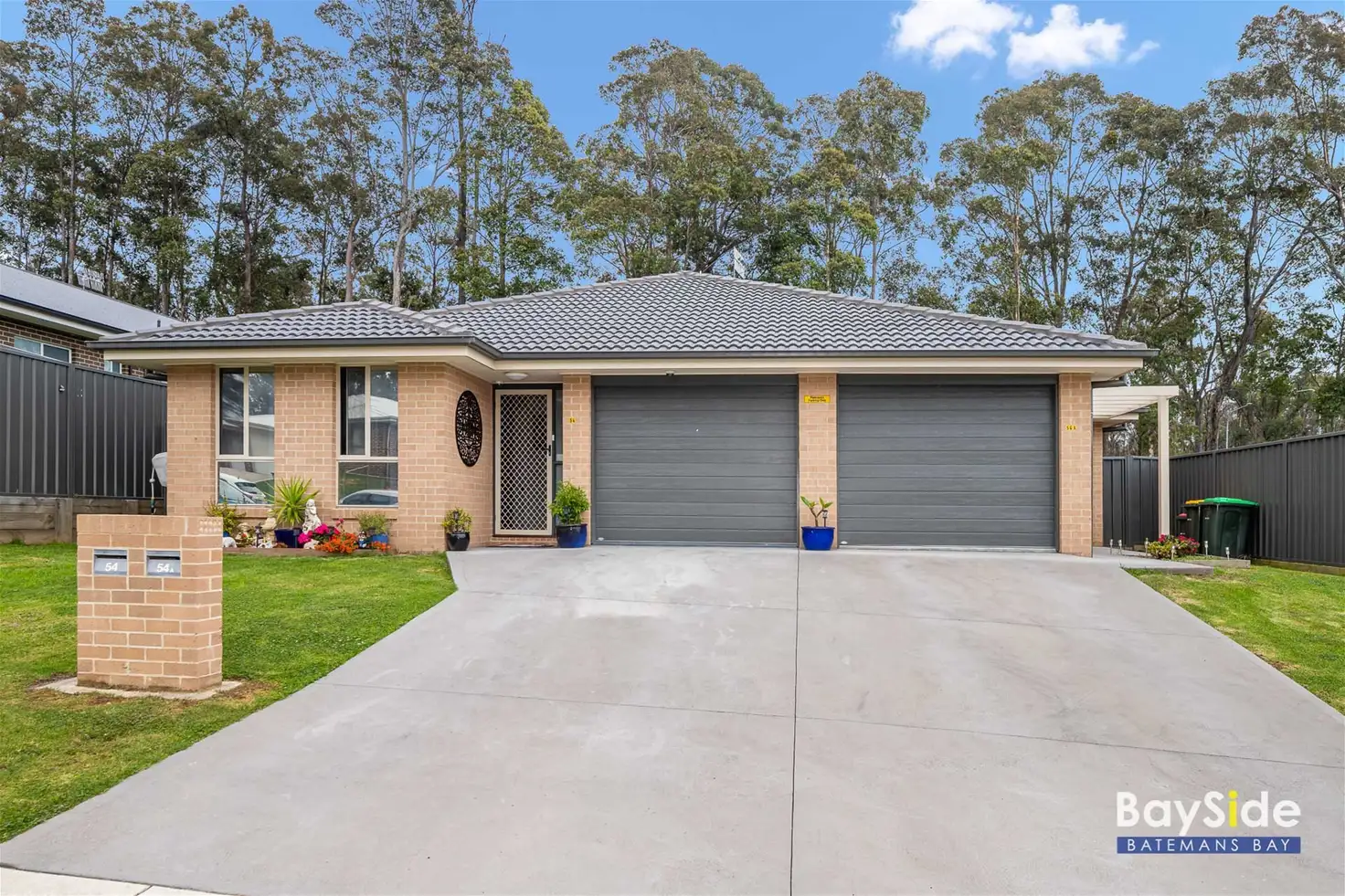 Main view of Homely semi-detached listing, 54 and 54A Freycinet Drive, Sunshine Bay NSW 2536