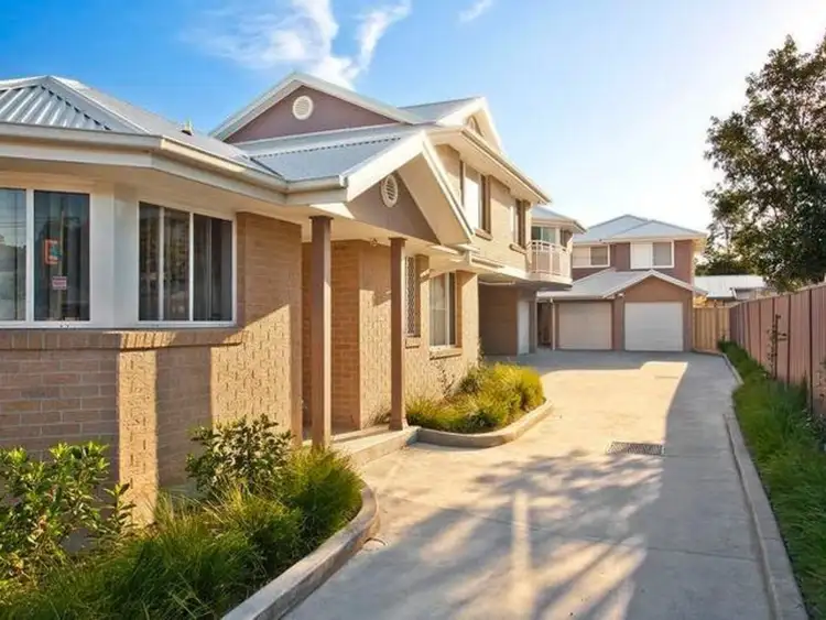 Main view of Homely townhouse listing, 1/494 Pacific Highway, Wyoming NSW 2250