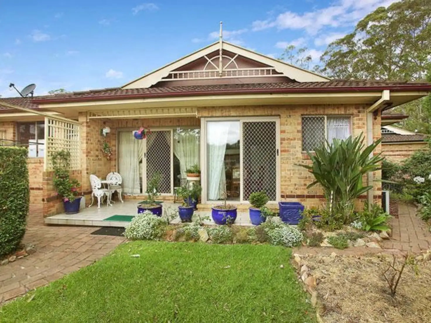 Main view of Homely townhouse listing, 1/12 Kinarra Avenue, Wyoming NSW 2250