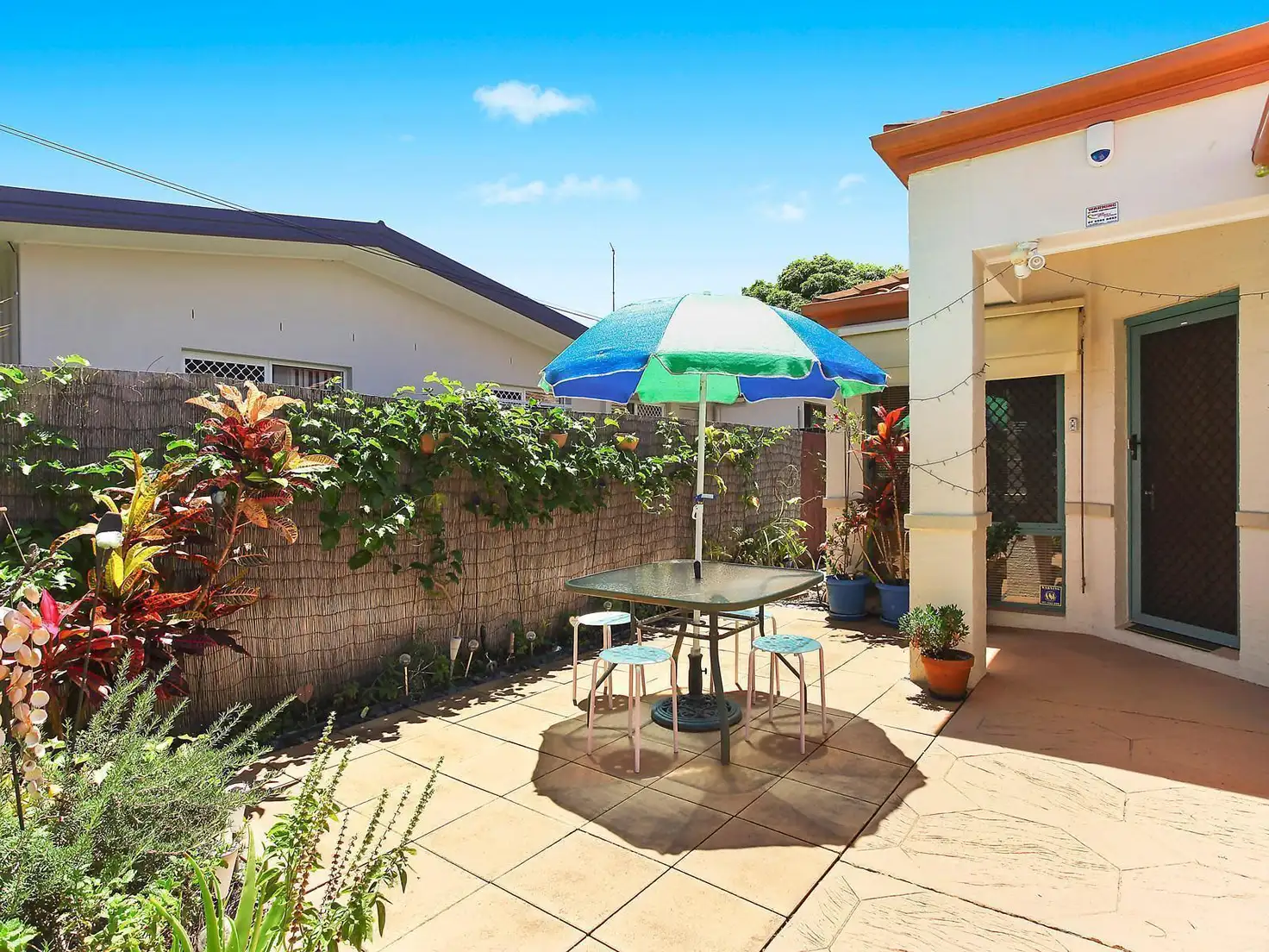 Main view of Homely townhouse listing, 1/7 Coral Avenue, Labrador QLD 4215