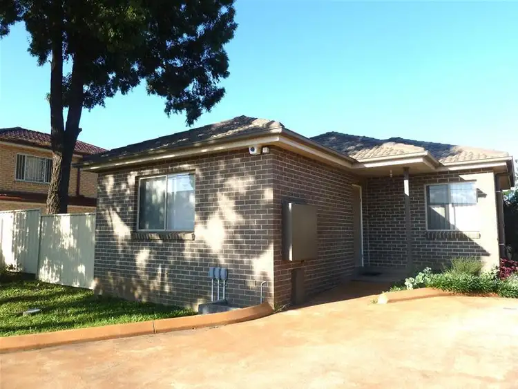 Main view of Homely villa listing, 1/323 - 325 Hector Street, Bass Hill NSW 2197