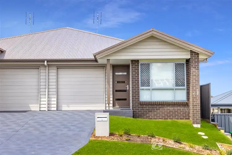 Main view of Homely semi-detached listing, 4 Gascoyne Street, Cameron Park NSW 2285