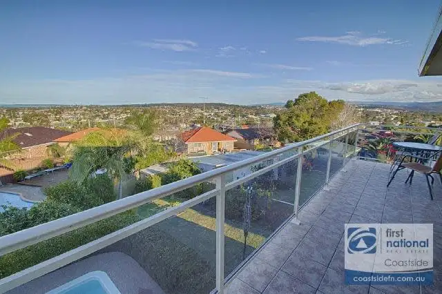 Main view of Homely house listing, 1 Matthews Drive, Mount Warrigal NSW 2528