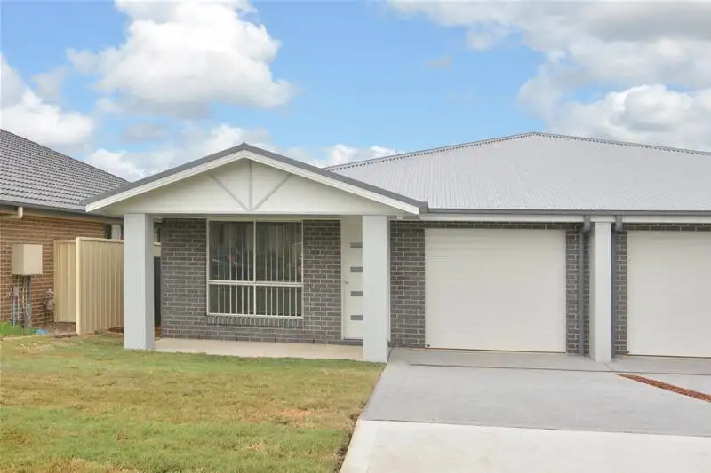 Main view of Homely semi-detached listing, 1/39 Ashton Drive, Heddon Greta NSW 2321