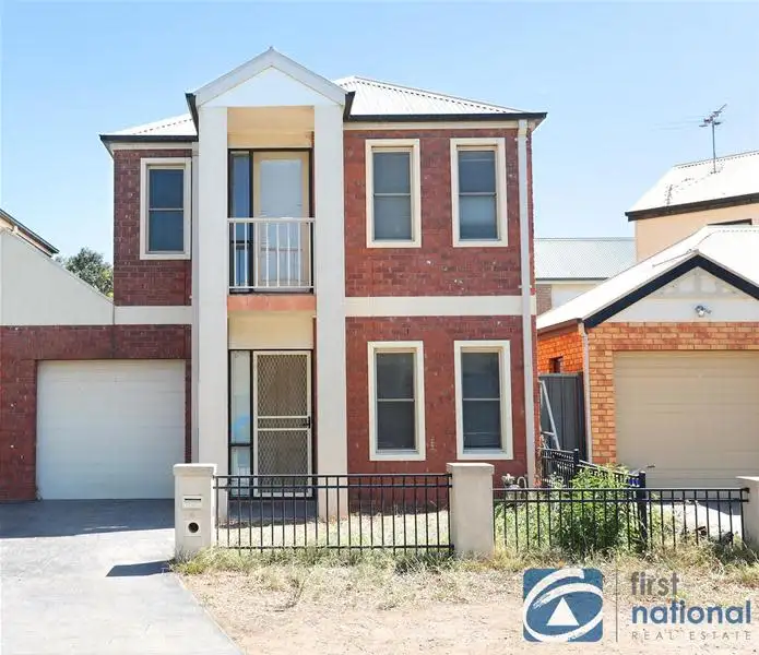 Main view of Homely townhouse listing, 4 Lauffre Walk, Caroline Springs VIC 3023