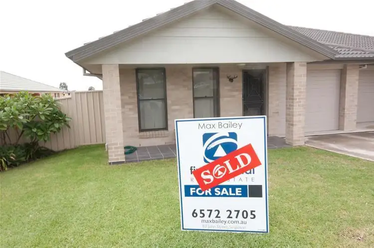 Main view of Homely semi-detached listing, 1/67 Casey Drive, Singleton NSW 2330