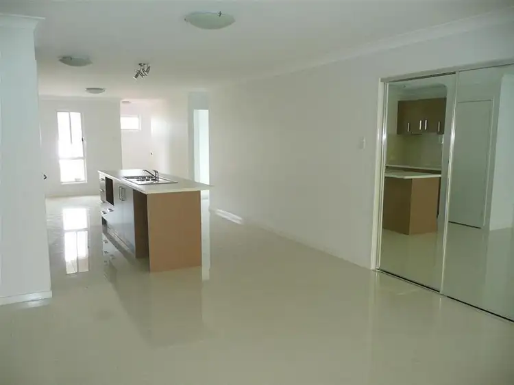 Third view of Homely semi-detached listing, 1/66 Hawkesbury Avenue, Pacific Pines QLD 4211