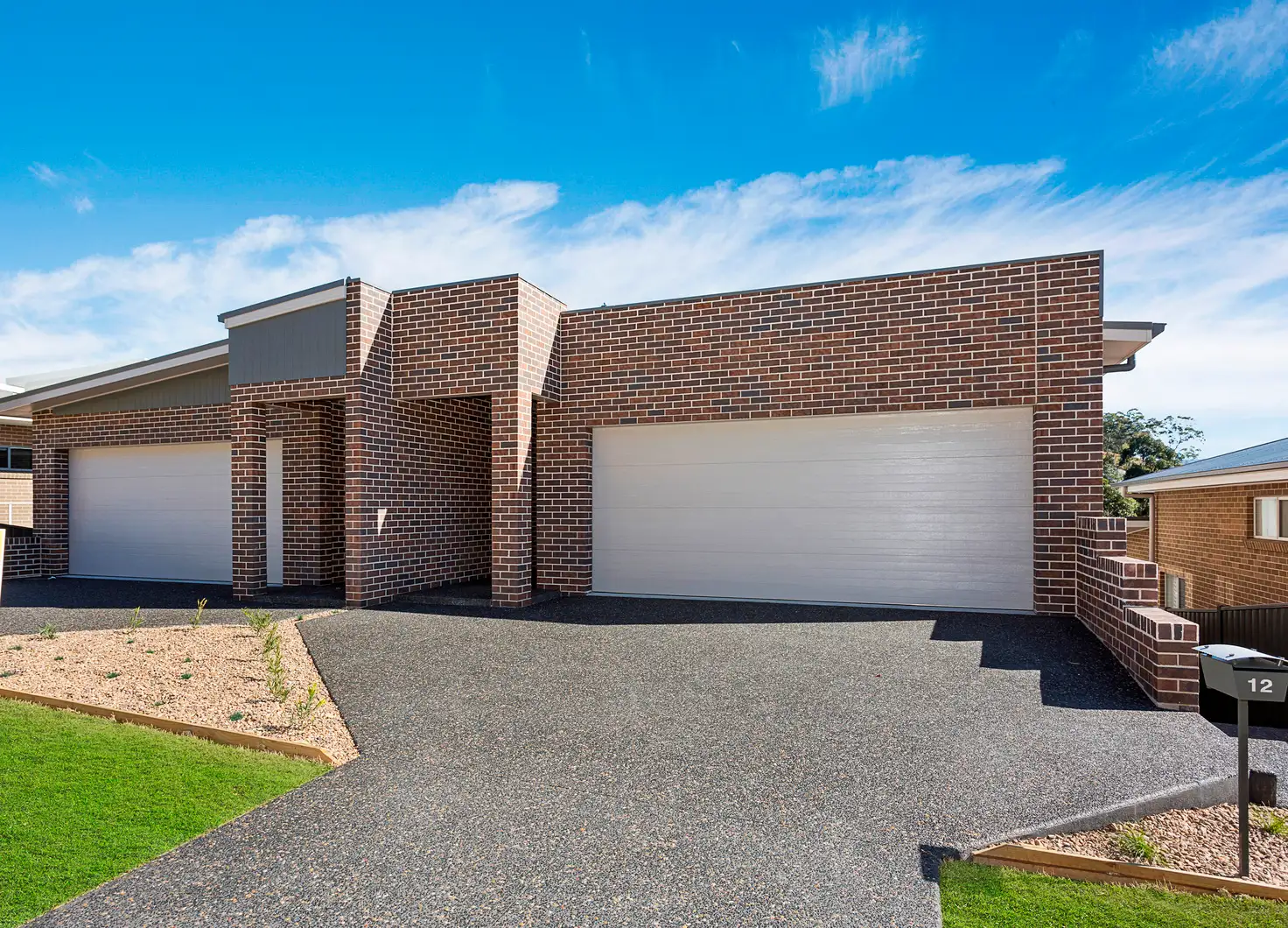 Main view of Homely semi-detached listing, 12 Whistlers Run, Albion Park NSW 2527