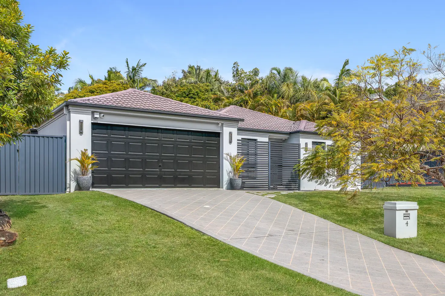 Main view of Homely house listing, 4 Polynesia Avenue, Pacific Pines QLD 4211