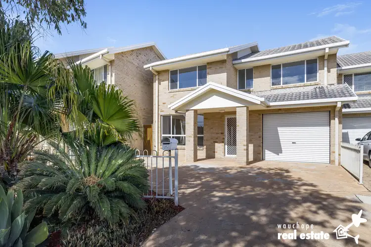 Main view of Homely townhouse listing, 2/1604 Ocean Drive, Lake Cathie NSW 2445