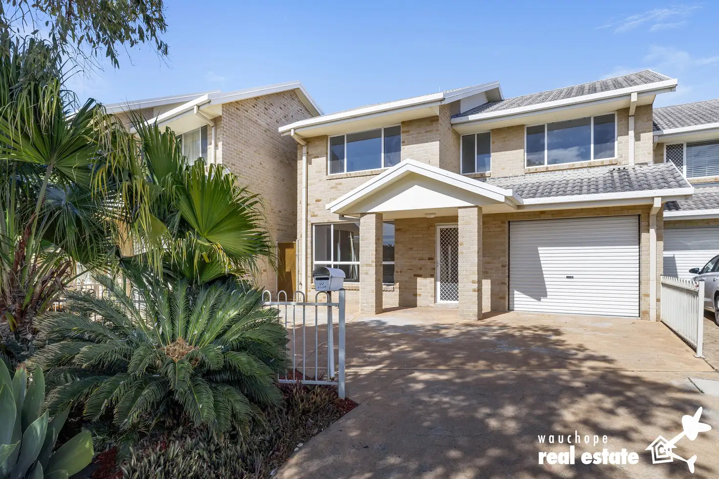 Main view of Homely townhouse listing, 2/1604 Ocean Drive, Lake Cathie NSW 2445