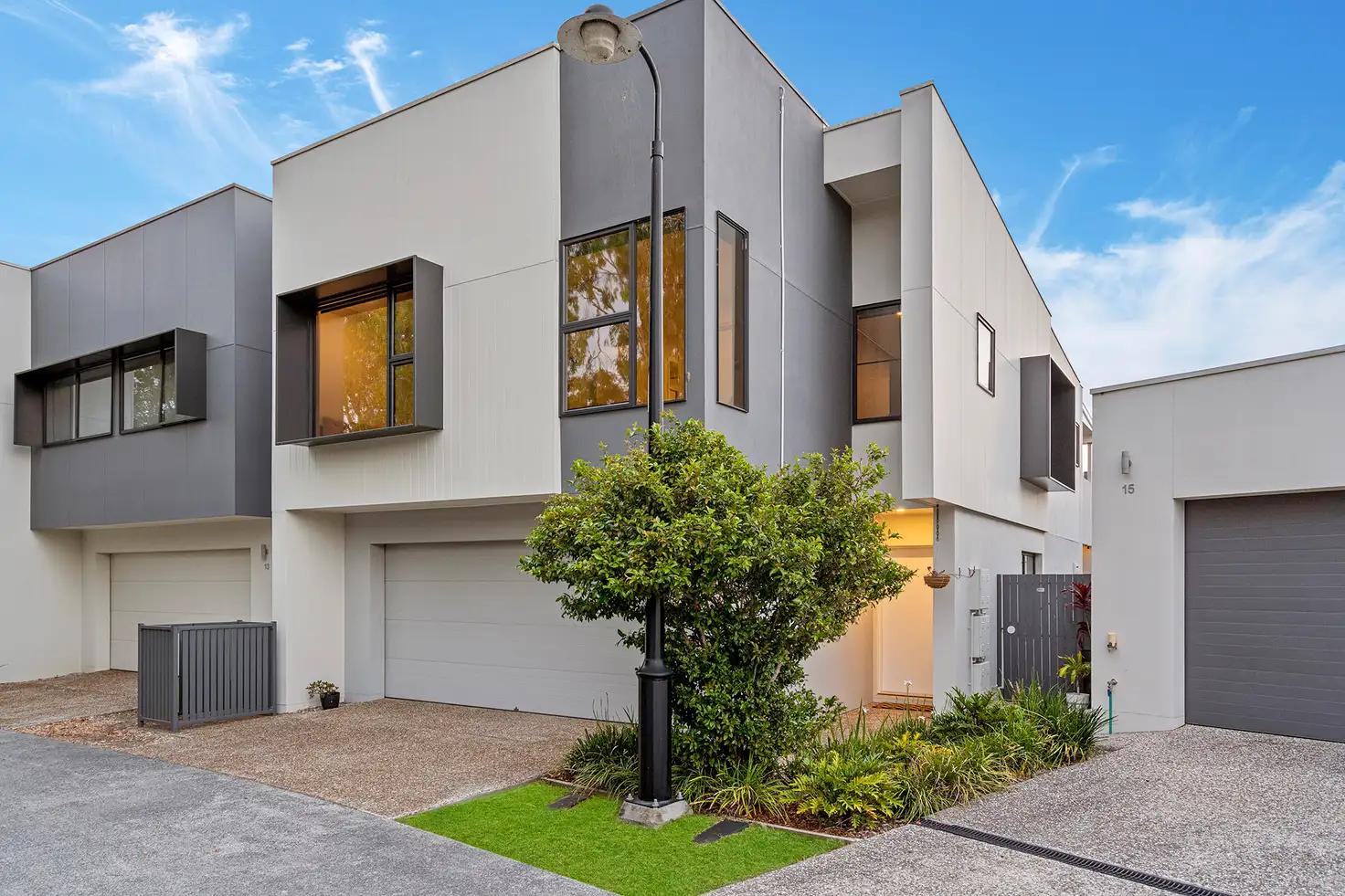 Main view of Homely townhouse listing, 14/1 Flametree Circuit, Arundel QLD 4214
