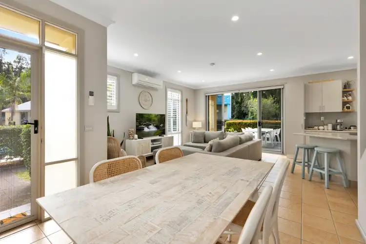 Main view of Homely townhouse listing, 1/1A Myamba Parade, Surfside NSW 2536