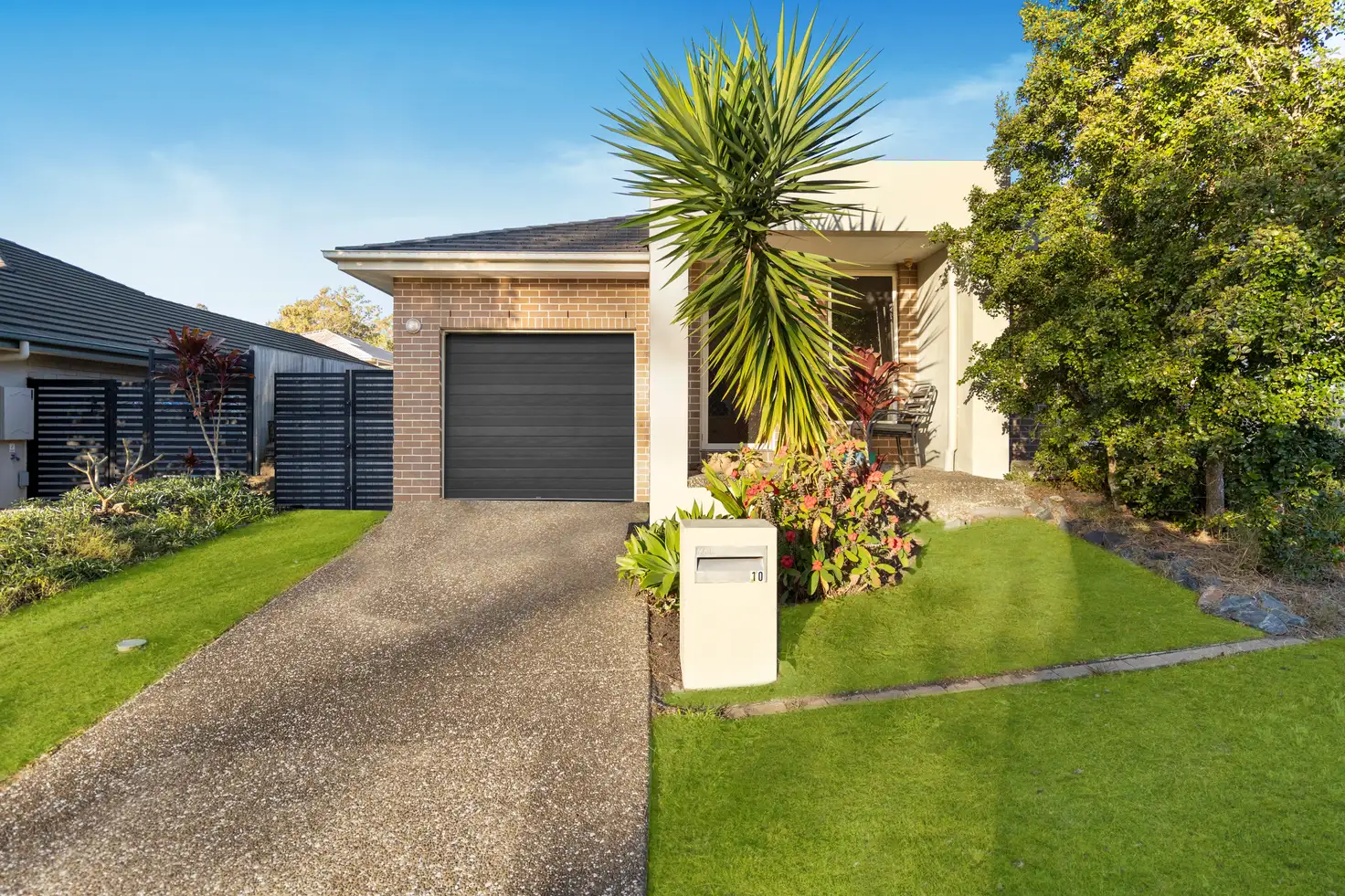 Main view of Homely semi-detached listing, 1/10 Orlando Drive, Holmview QLD 4207