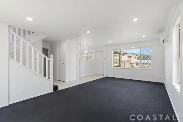 Main view of Homely townhouse listing, 13/279 Cotlew Street West, Ashmore QLD 4214
