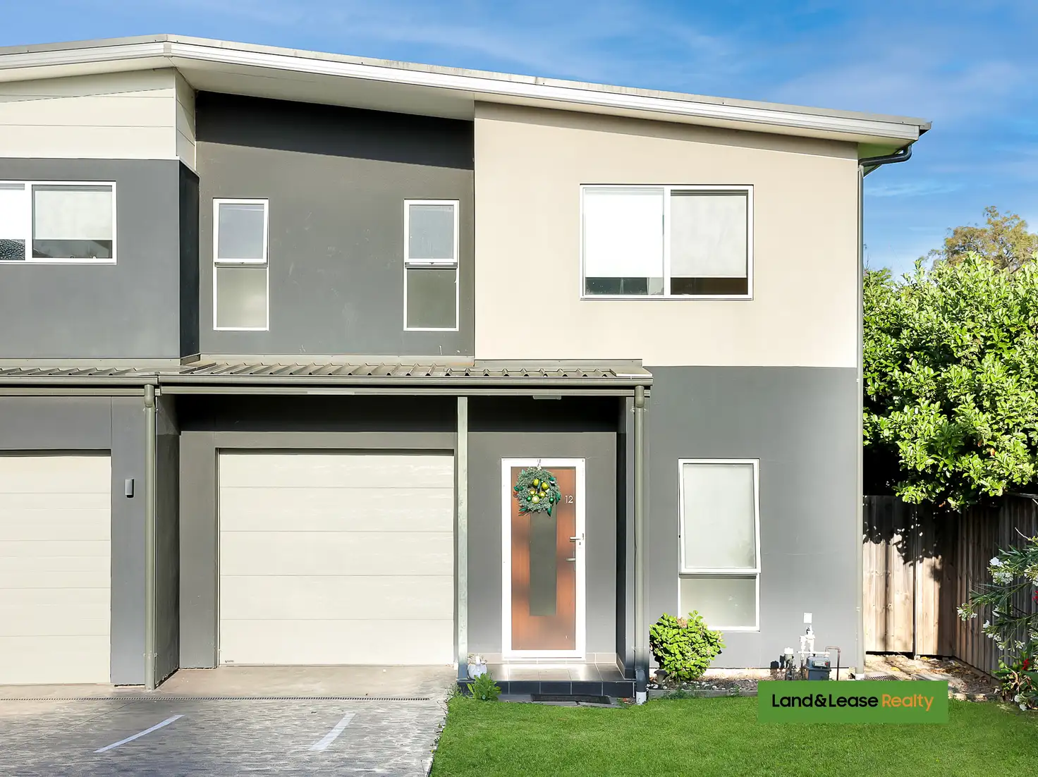 Main view of Homely townhouse listing, 12/52A Atlantic Boulevard, Glenfield NSW 2167