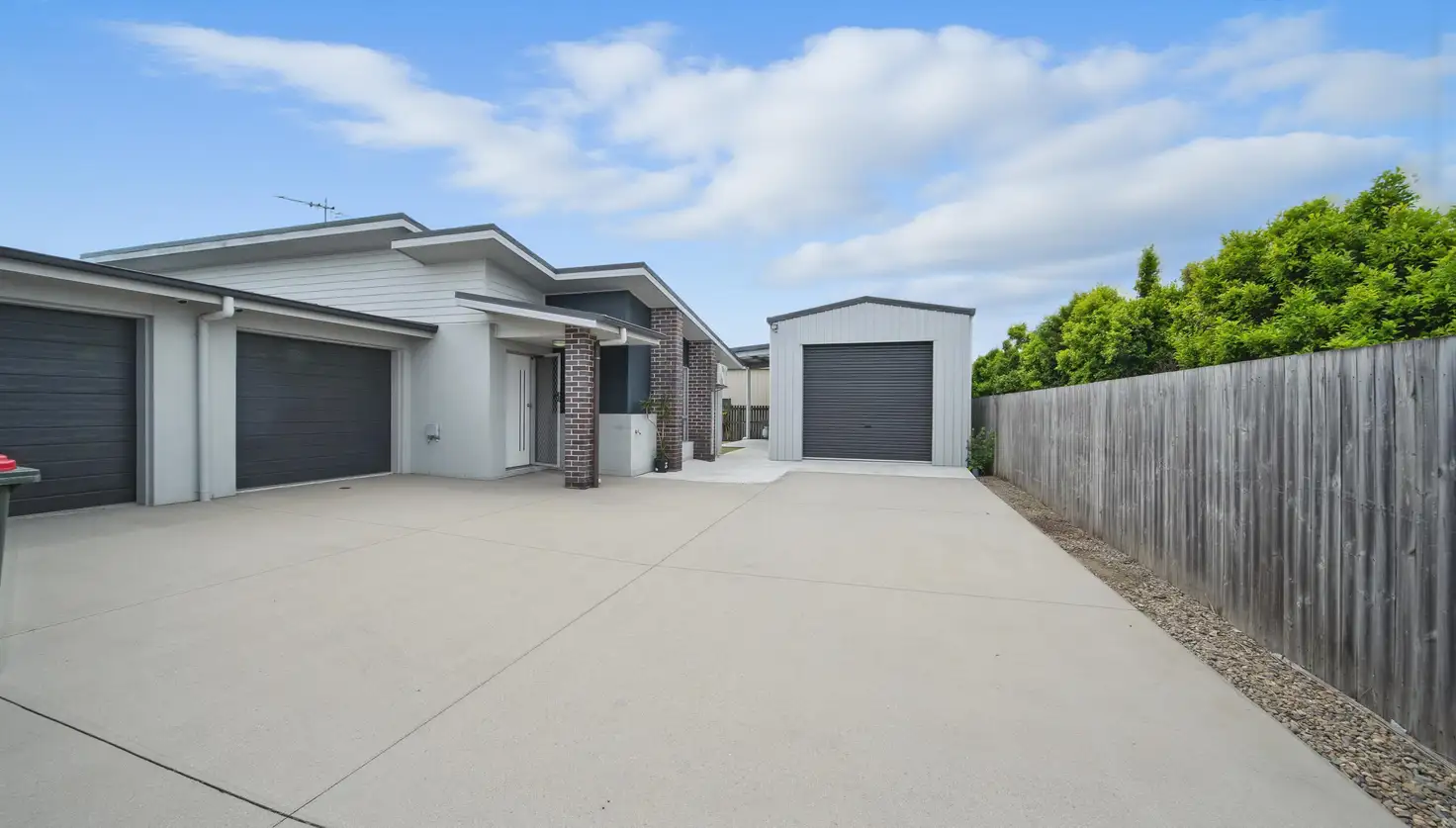 Main view of Homely townhouse listing, 2/8 Farming Road, Ooralea QLD 4740