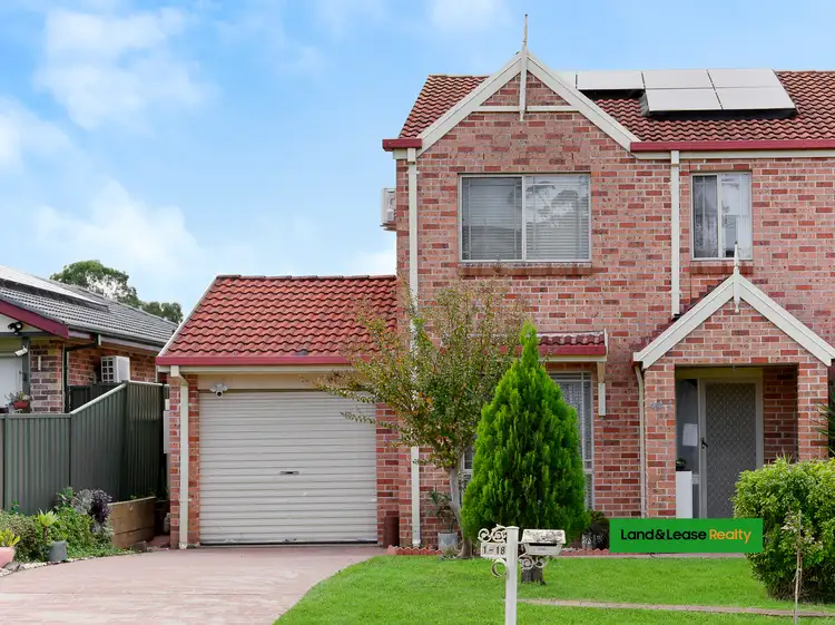 Main view of Homely semi-detached listing, 1/18 Azalea Place, Macquarie Fields NSW 2564