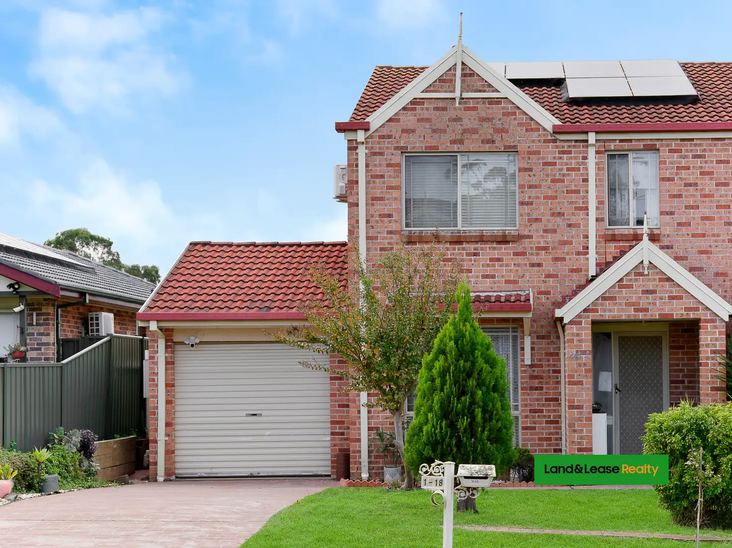 Main view of Homely semi-detached listing, 1/18 Azalea Place, Macquarie Fields NSW 2564
